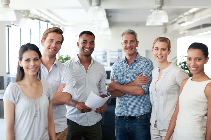 Portrait of a group of colleagues standing in an officehttp://195.154.178.81/DATA/i_collage/pu/shoots/805874.jpg